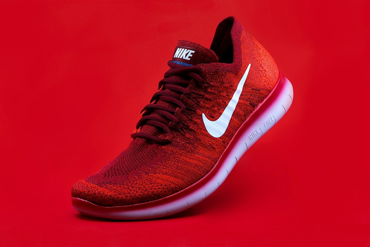 Original red shoe photograph against a red background