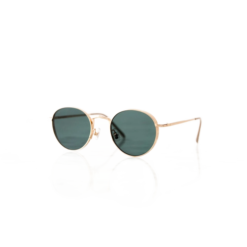 Round green-lens sunglasses with a fine gold frame on a white surface, background removed
